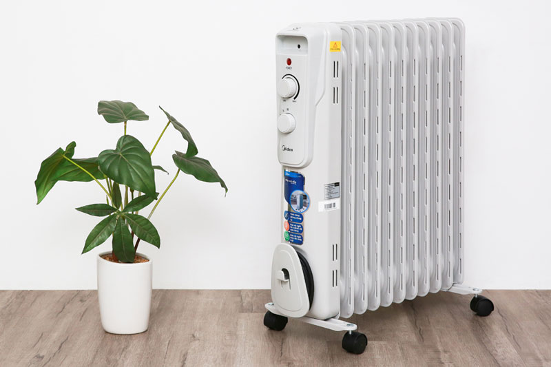 quat-suoi-dau-midea-mh-023-11a-2 Quạt sưởi dầu Midea MH-O23-11A